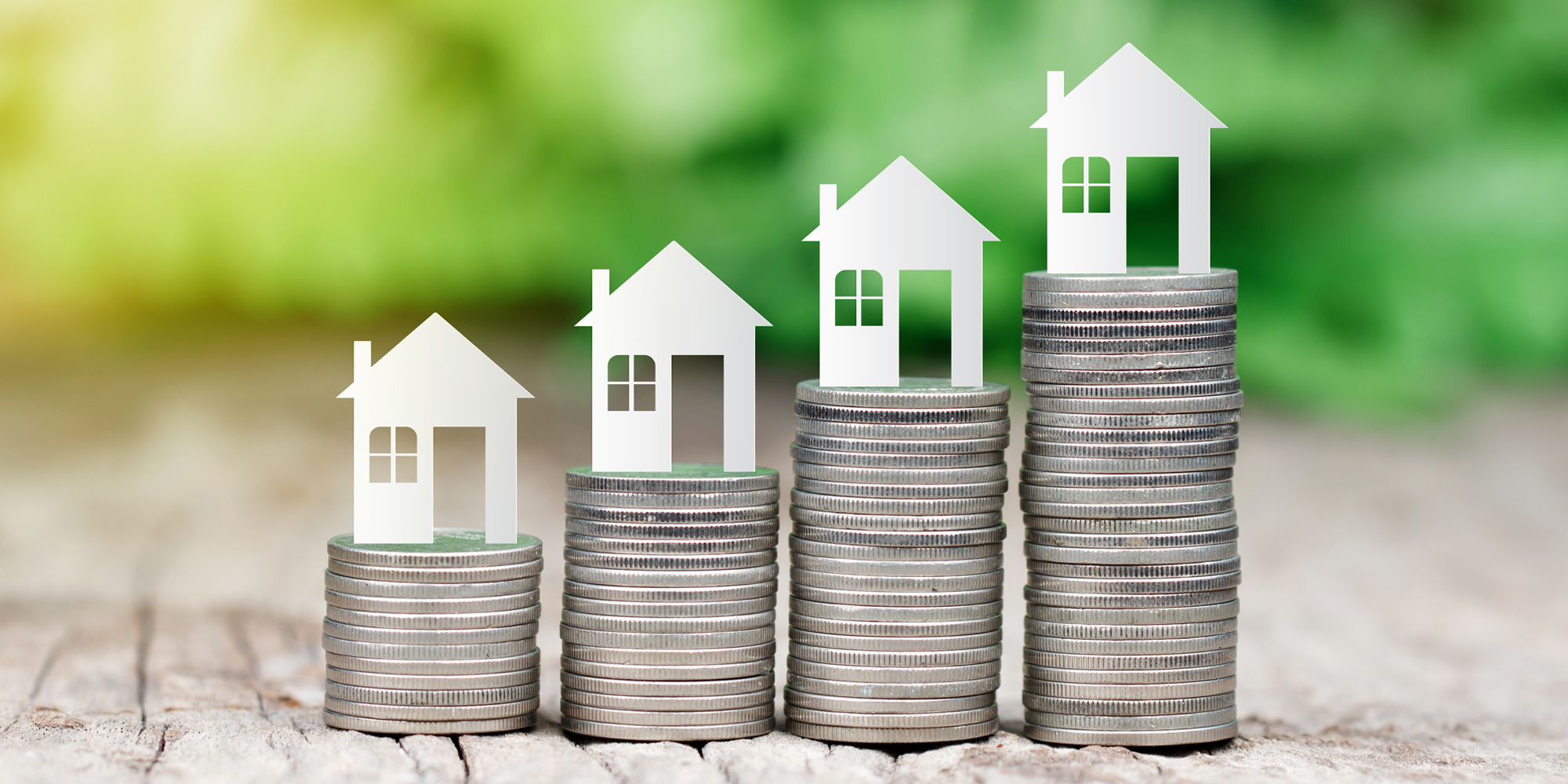 Going solar - Home Value - A graphic of houses on top on coins